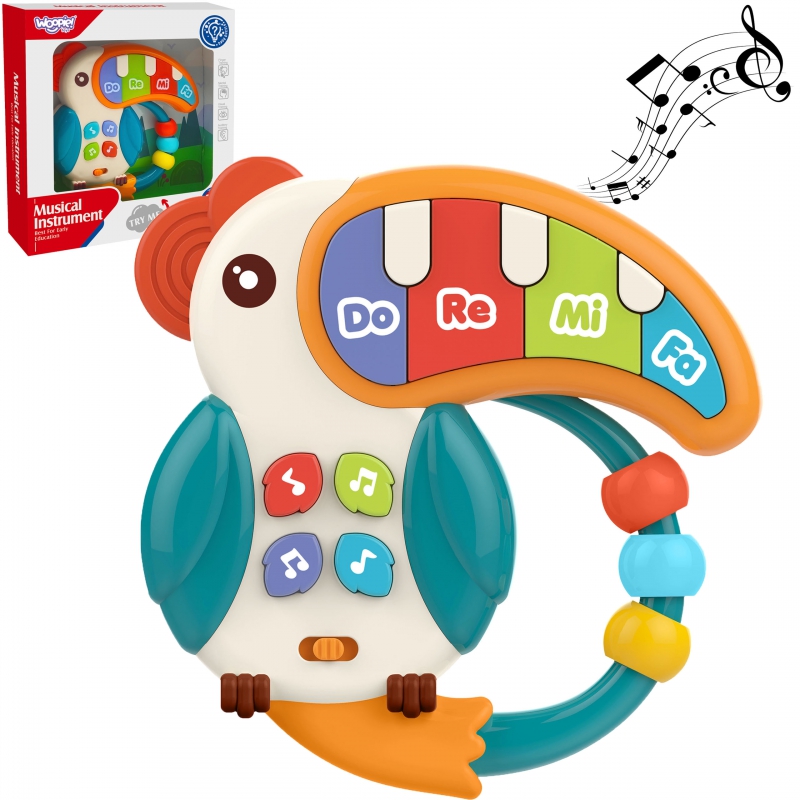 WOOPIE BABY muzikinis žaislas fortepijonas Teether Pelikan 3in1